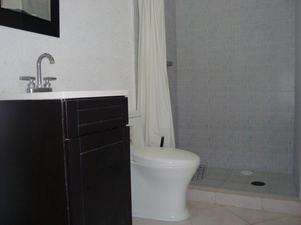 Hotel Teques Inn Текескітенго Номер фото